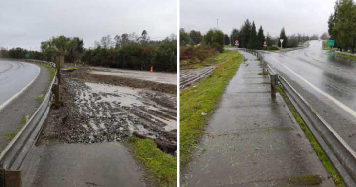 Foto donde hay una vereda que va a un costado de una carretera, pero la vereda está cortada y luego viene un desnivel y abajo solo barro y agua.