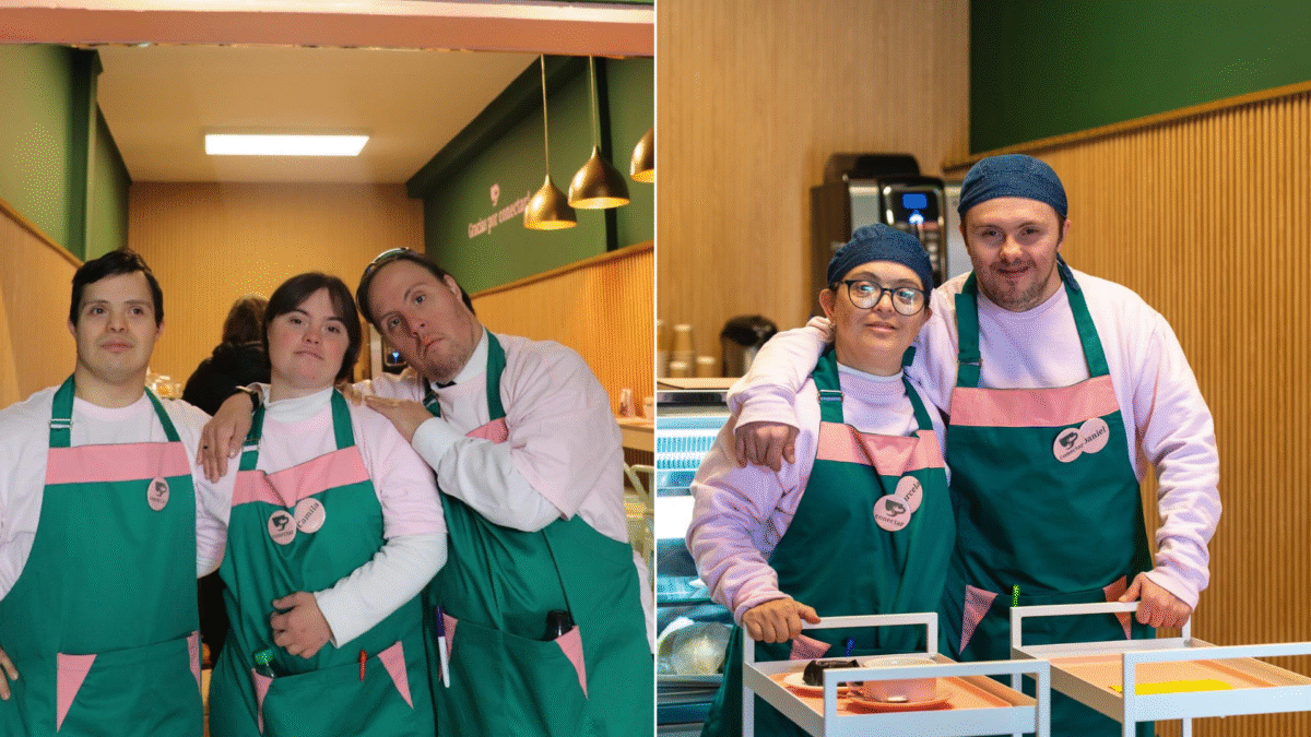 Foto de un grupo de meseros con síndrome de down posando para la foto en la cafetería conectar